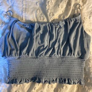 blue ruffled tank top